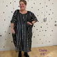 Black and silver striped kaftan showing the model in a size 3/4