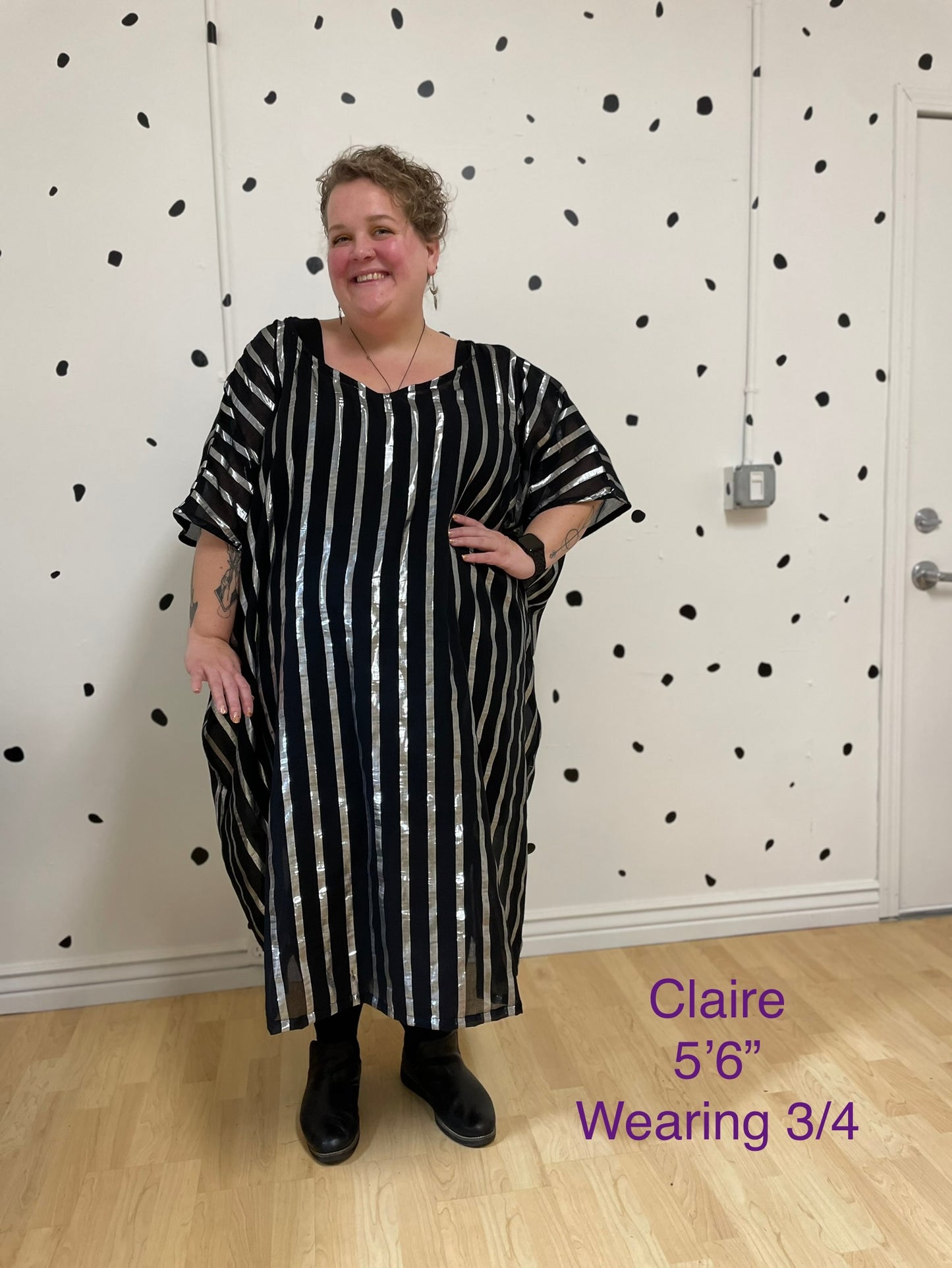 Black and silver striped kaftan showing the model in a size 3/4