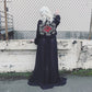 Long black chiffon robe with bishop sleeves. On the back embroidered white swirls and red roses